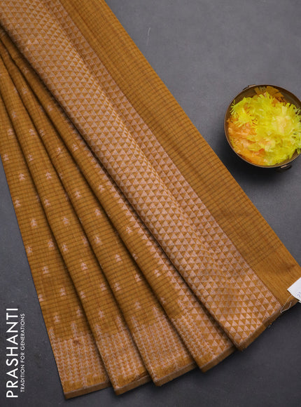 Banarasi semi matka saree dark mustard with allover zari woven geometric buttas and zari woven border