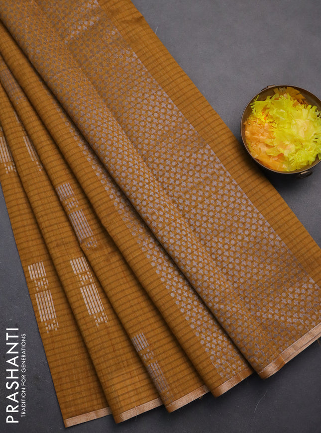 Banarasi semi matka saree dark mustard with silver & gold zari woven buttas and zari woven piping border