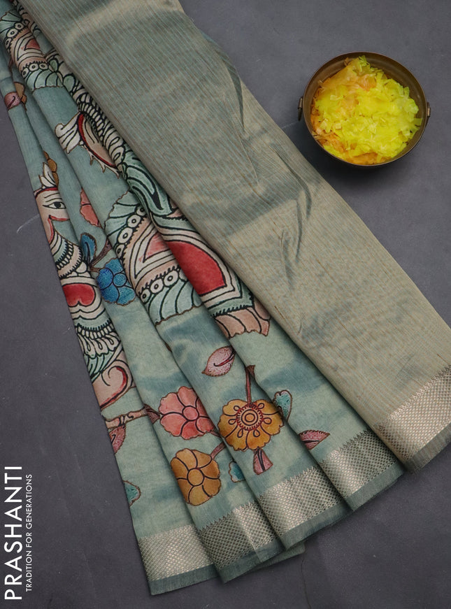 Semi tussar saree teal green shade with kalamkari applique work and zari woven border