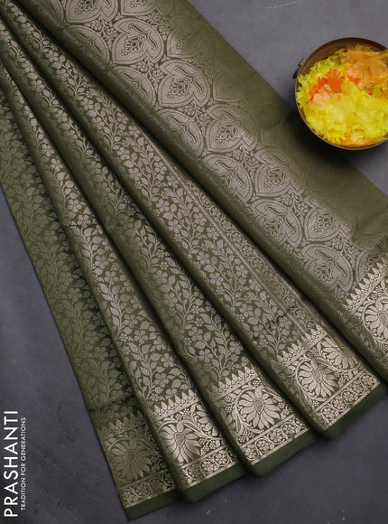 Semi soft silk saree sap green with allover zari woven brocade weaves -Without blouse