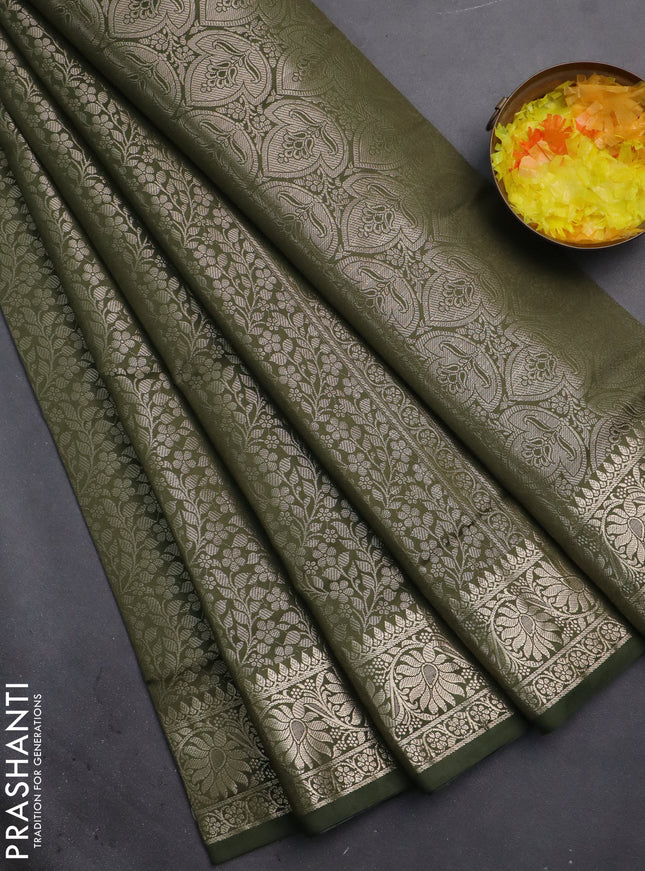 Semi soft silk saree sap green with allover zari woven brocade weaves -Without blouse