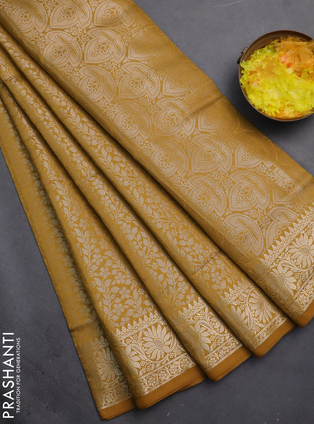 Semi soft silk saree mustard yellow with allover zari woven brocade weaves -Without blouse