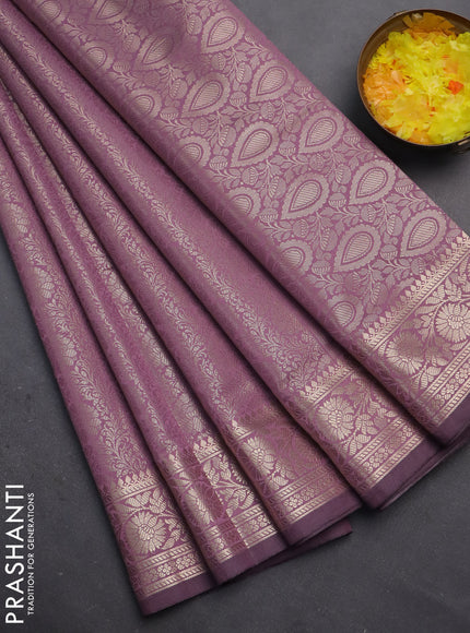 Semi soft silk saree mild purple shade with allover zari woven brocade weaves -Without blouse