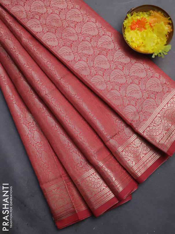 Semi soft silk saree peach shade with allover zari woven brocade weaves -Without blouse