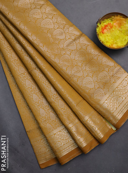 Semi soft silk saree mustard yellow with allover zari woven brocade weaves -Without blouse