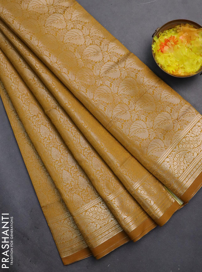 Semi soft silk saree mustard yellow with allover zari woven brocade weaves -Without blouse