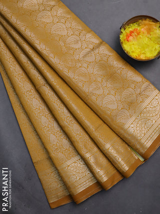 Semi soft silk saree mustard yellow with allover zari woven brocade weaves -Without blouse