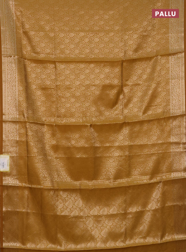 Semi soft silk saree mustard yellow with allover zari woven brocade weaves -Without blouse