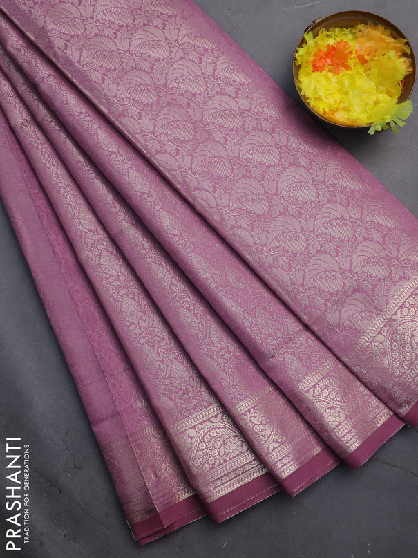 Semi soft silk saree mild purple with allover zari woven brocade weaves -Without blouse