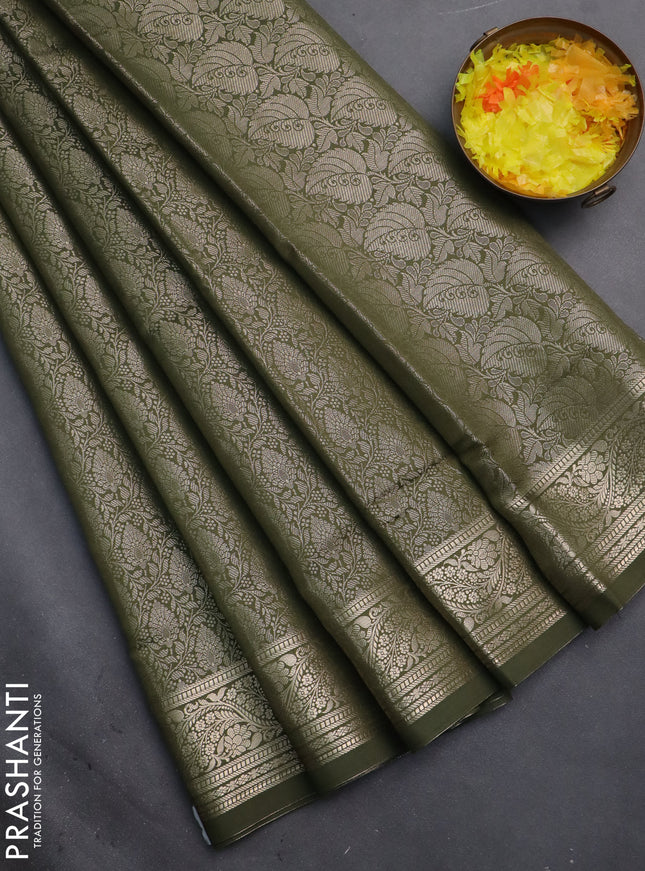 Semi soft silk saree sap green with allover zari woven brocade weaves -Without blouse