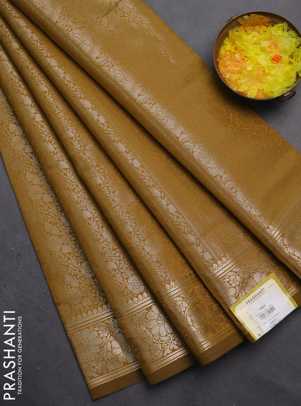 Semi soft silk saree mustard shade with allover zari woven brocade weaves -Without blouse