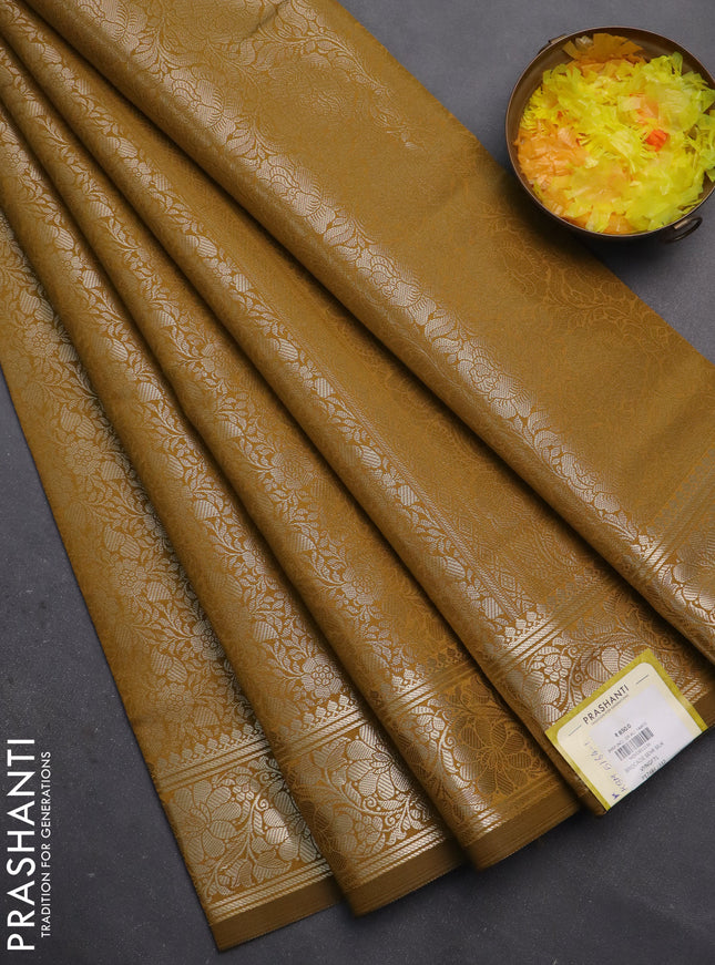 Semi soft silk saree mustard shade with allover zari woven brocade weaves -Without blouse
