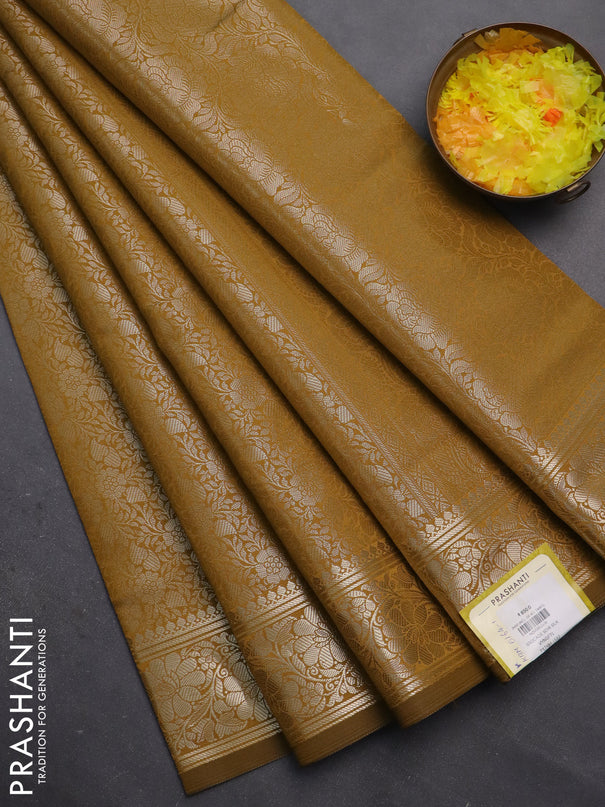 Semi soft silk saree mustard shade with allover zari woven brocade weaves -Without blouse