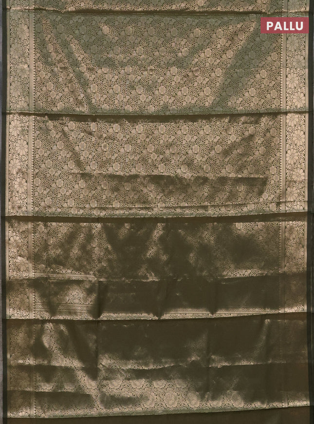 Semi soft silk saree sap green with allover zari woven brocade weaves -Without blouse