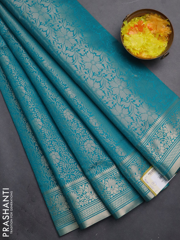 Semi soft silk saree teal blue with allover zari woven brocade weaves -Without blouse