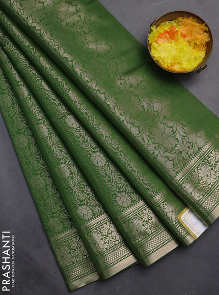Semi soft silk saree green with allover zari woven brocade weaves -Without blouse