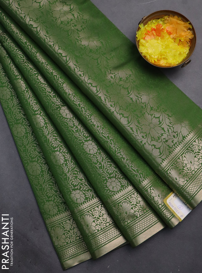 Semi soft silk saree green with allover zari woven brocade weaves -Without blouse