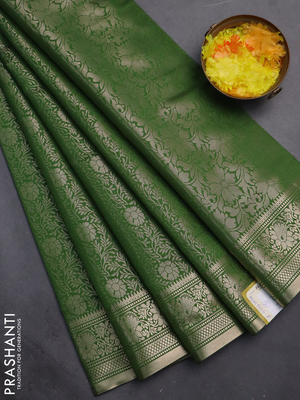 Semi soft silk saree green with allover zari woven brocade weaves -Without blouse