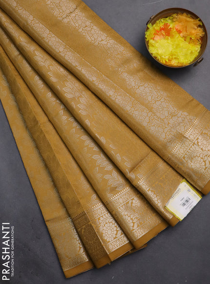 Semi soft silk saree mustard yellow with allover zari woven brocade weaves -Without blouse