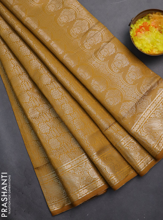 Semi soft silk saree mustard yellow with allover zari woven brocade weaves -Without blouse