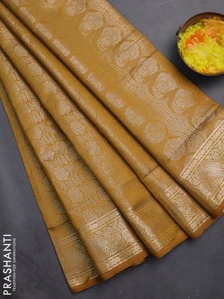 Semi soft silk saree mustard yellow with allover zari woven brocade weaves -Without blouse