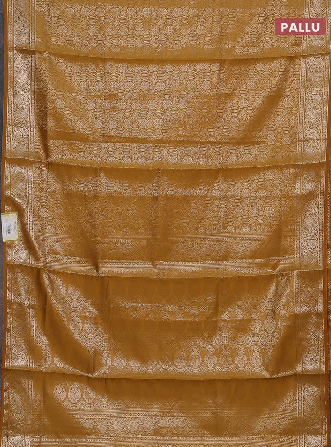 Semi soft silk saree mustard yellow with allover zari woven brocade weaves -Without blouse