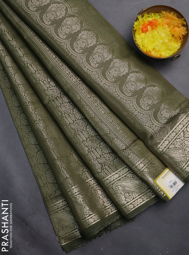 Semi soft silk saree sap green with allover zari woven brocade weaves -Without blouse