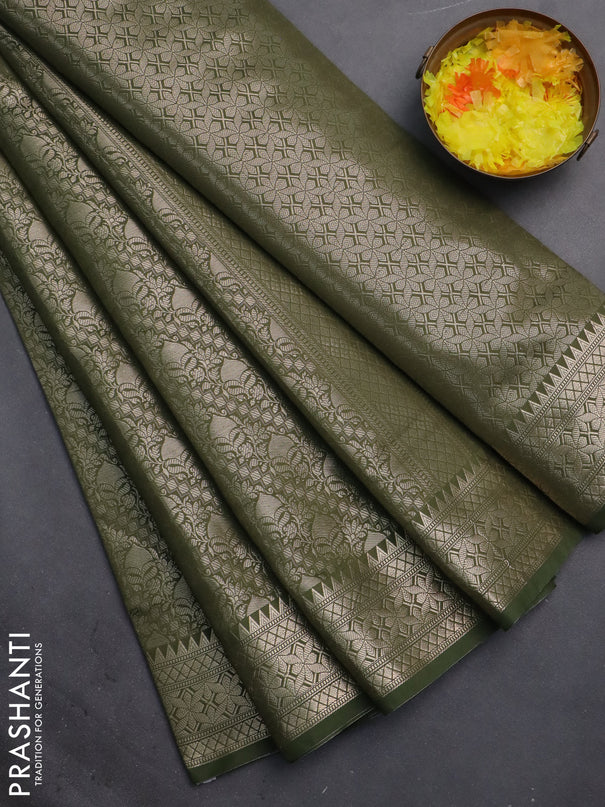 Semi soft silk saree sap green with allover zari woven brocade weaves -Without blouse