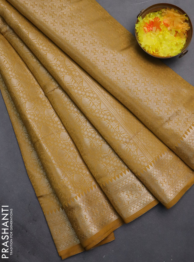 Semi soft silk saree mustard yellow with allover zari woven brocade weaves -Without blouse