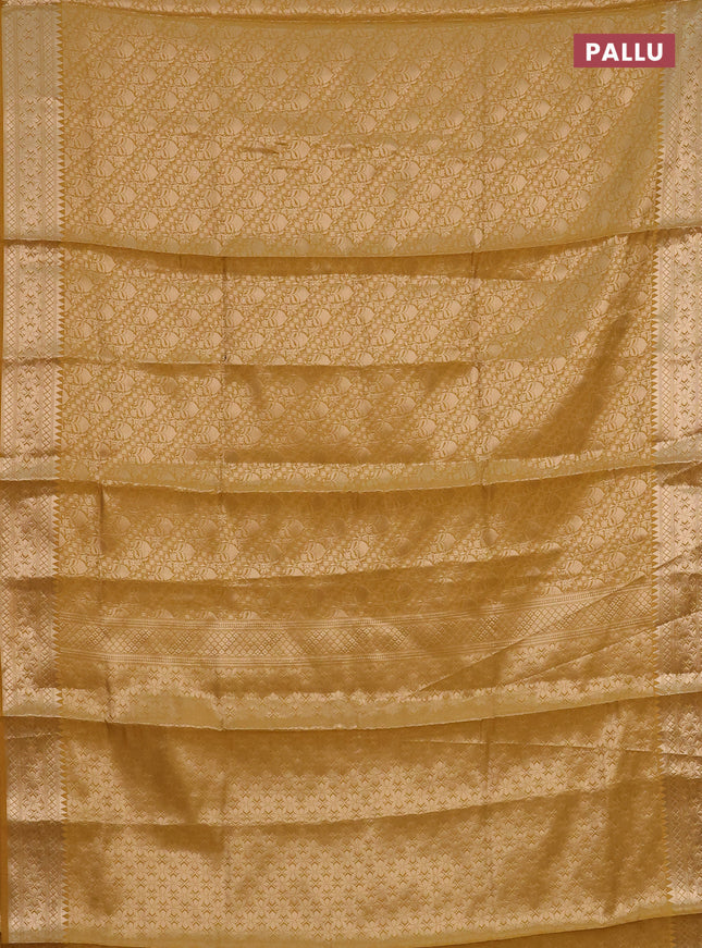 Semi soft silk saree mustard yellow with allover zari woven brocade weaves -Without blouse
