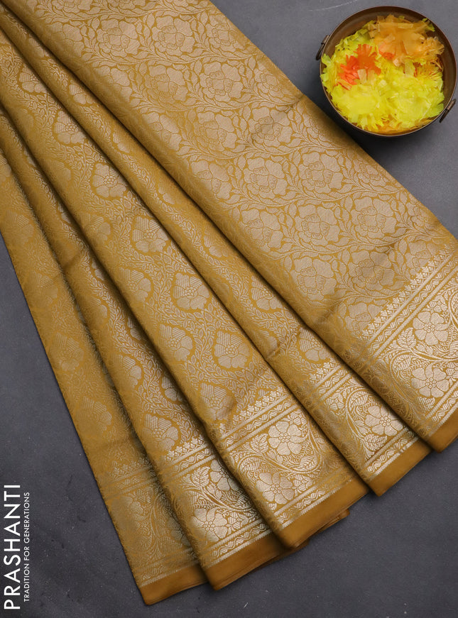 Semi soft silk saree mustard yellow with allover zari woven brocade weaves -Without blouse