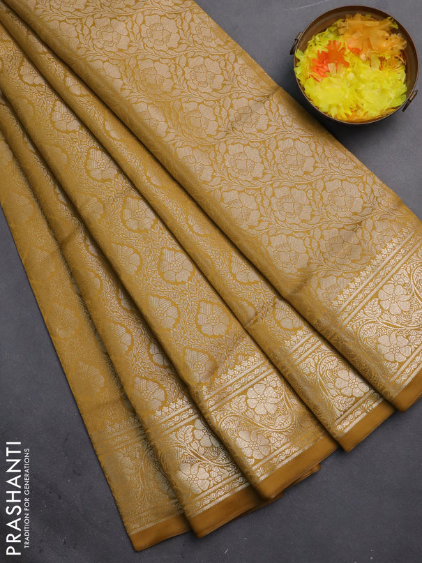 Semi soft silk saree mustard yellow with allover zari woven brocade weaves -Without blouse