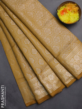 Semi soft silk saree mustard yellow with allover zari woven brocade weaves -Without blouse