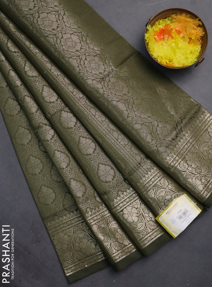 Semi soft silk saree sap green with allover zari woven brocade weaves -Without blouse