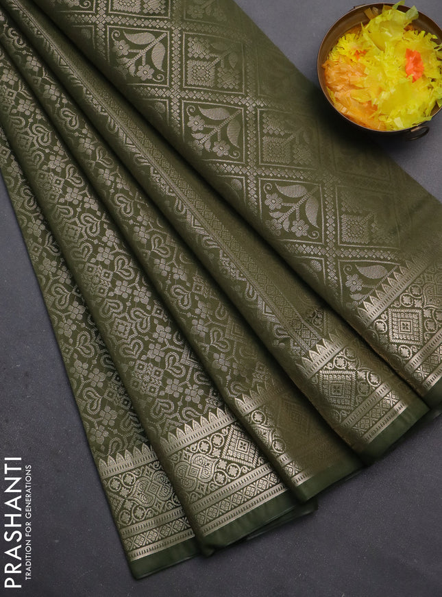 Semi soft silk saree sap green with allover zari woven brocade weaves -Without blouse