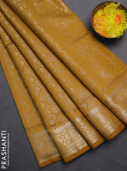 Semi soft silk saree mustard yellow with allover zari woven brocade weaves -Without blouse