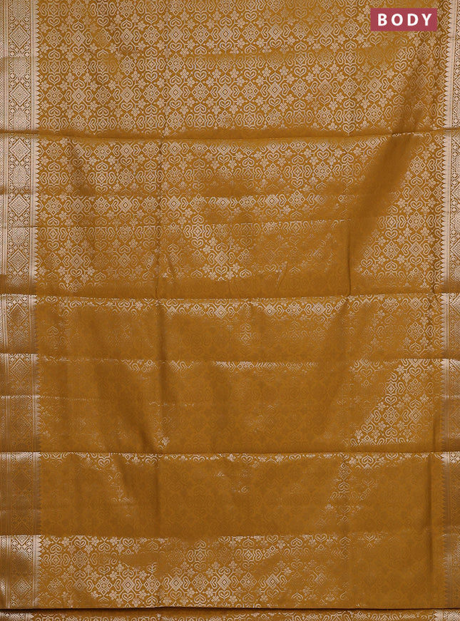 Semi soft silk saree mustard yellow with allover zari woven brocade weaves -Without blouse