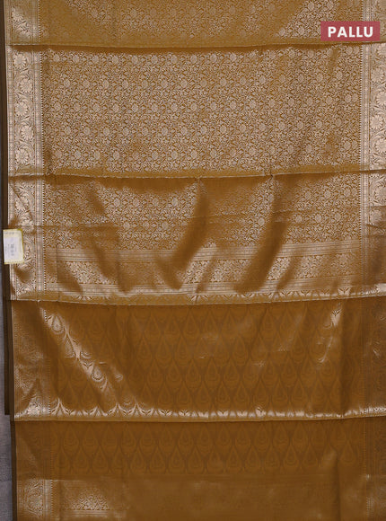 Semi soft silk saree mustard yellow with allover zari woven brocade weaves -Without blouse