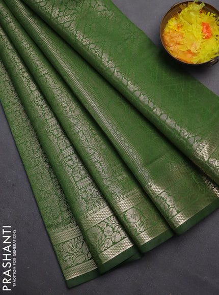 Semi soft silk saree green with allover zari woven brocade weaves -Without blouse
