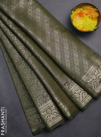 Semi soft silk saree sap green with allover zari woven brocade weaves -Without blouse