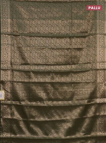 Semi soft silk saree sap green with allover zari woven brocade weaves -Without blouse