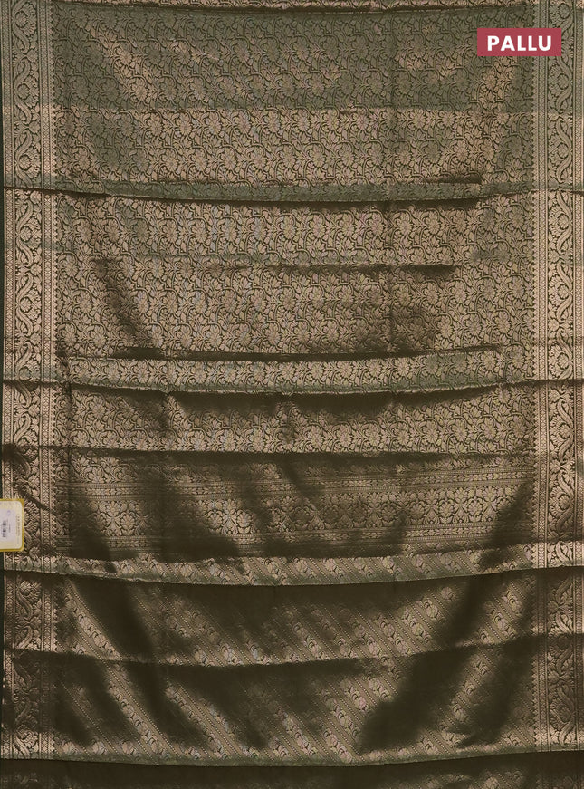 Semi soft silk saree sap green with allover zari woven brocade weaves -Without blouse