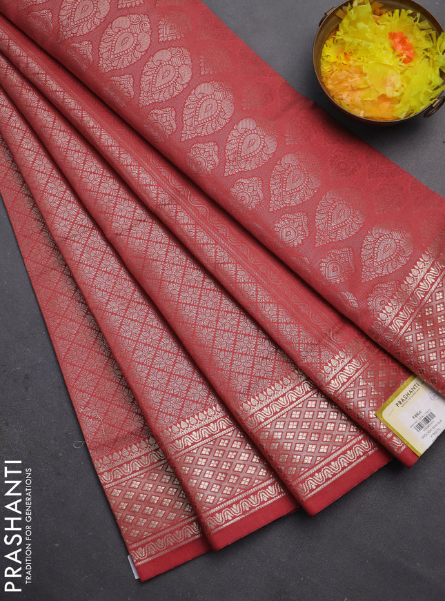 Semi soft silk saree rust shade with allover zari woven brocade weaves -Without blouse