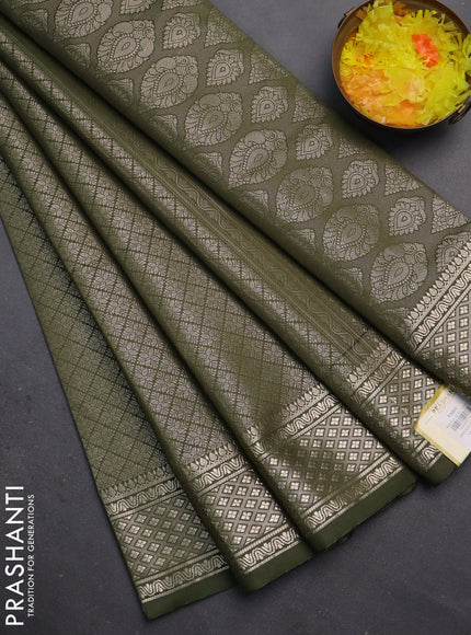 Semi soft silk saree sap green with allover zari woven brocade weaves -Without blouse