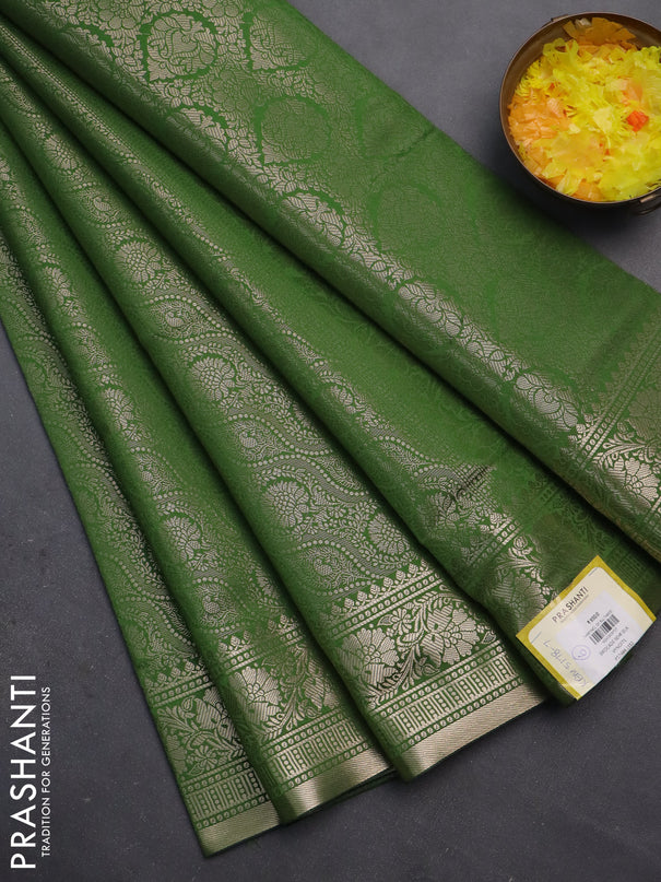 Semi soft silk saree green with allover zari woven brocade weaves -Without blouse