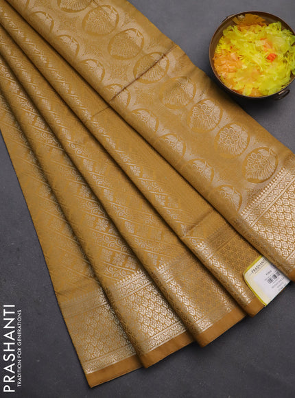 Semi soft silk saree mustard yellow with allover zari woven brocade weaves -Without blouse