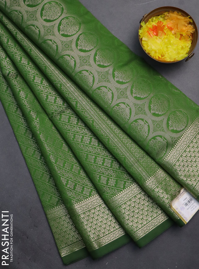 Semi soft silk saree green with allover zari woven brocade weaves -Without blouse