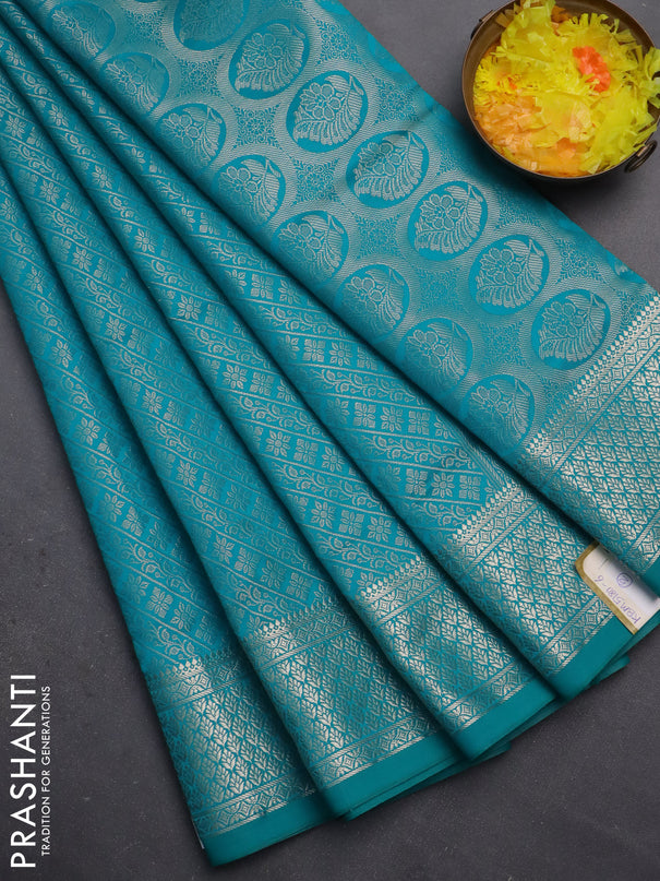 Semi soft silk saree teal blue with allover zari woven brocade weaves -Without blouse