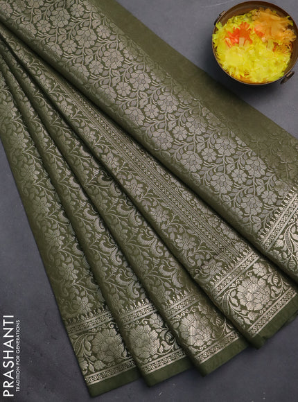 Semi soft silk saree sap green with allover zari woven brocade weaves -Without blouse
