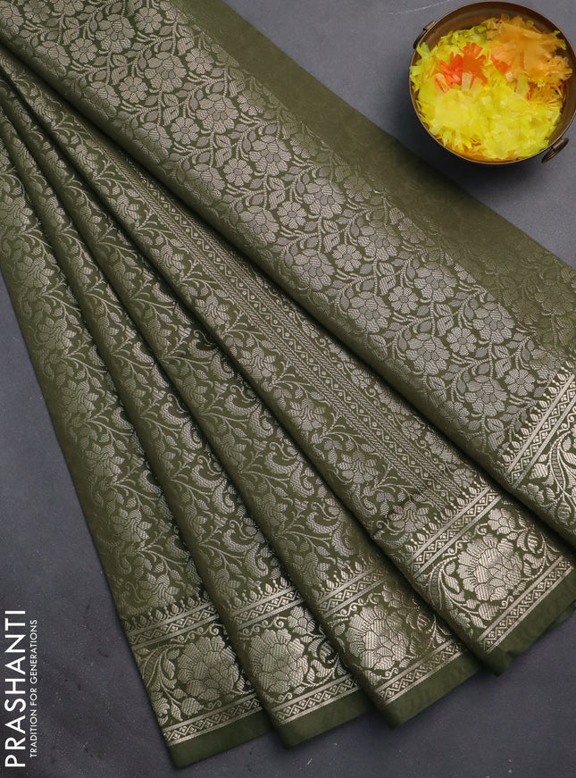 Semi soft silk saree sap green with allover zari woven brocade weaves -Without blouse